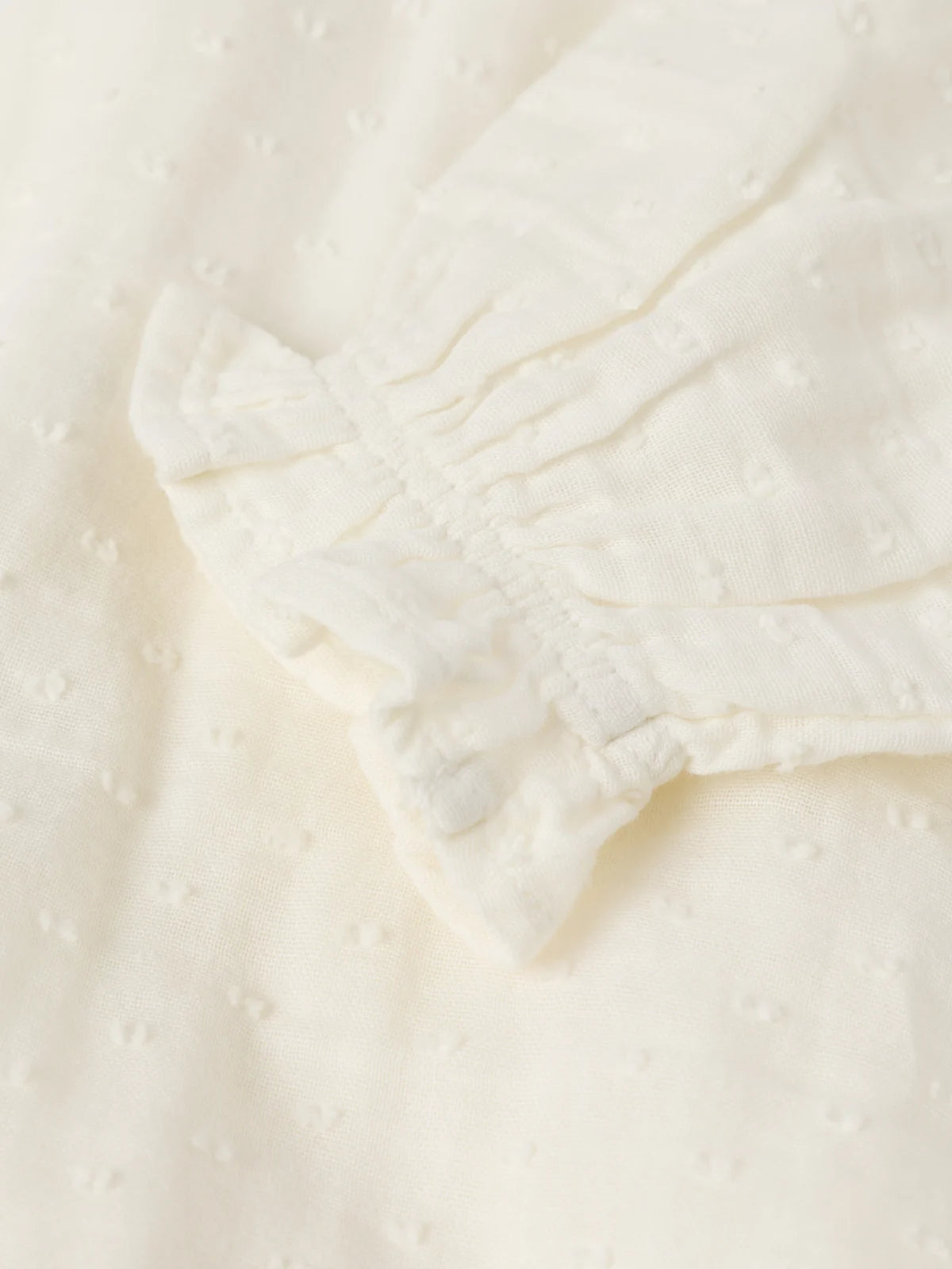 Blússa úr múslin með pífum