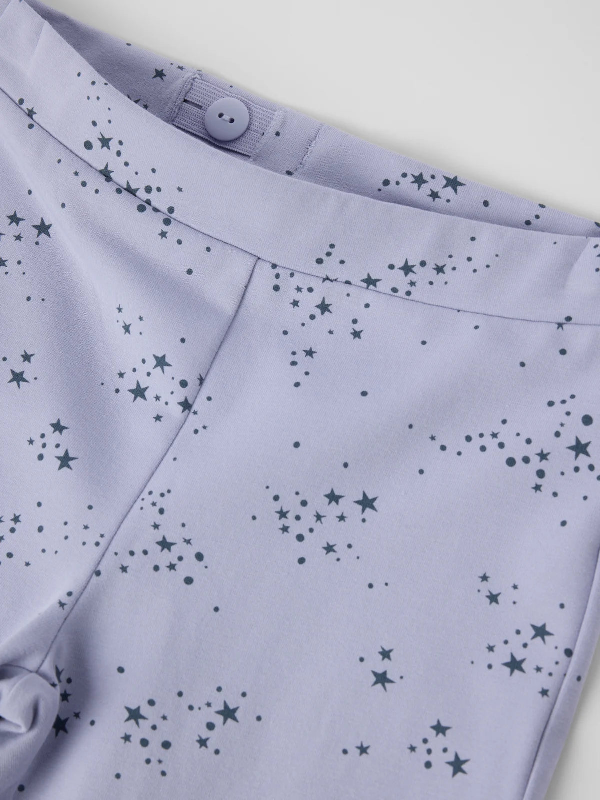 Útvíðar joggingbuxur með stjörnum