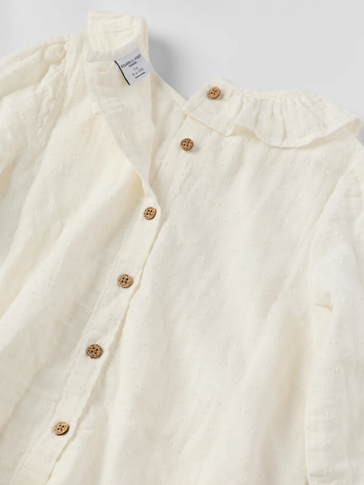 Blússa úr múslin með pífum