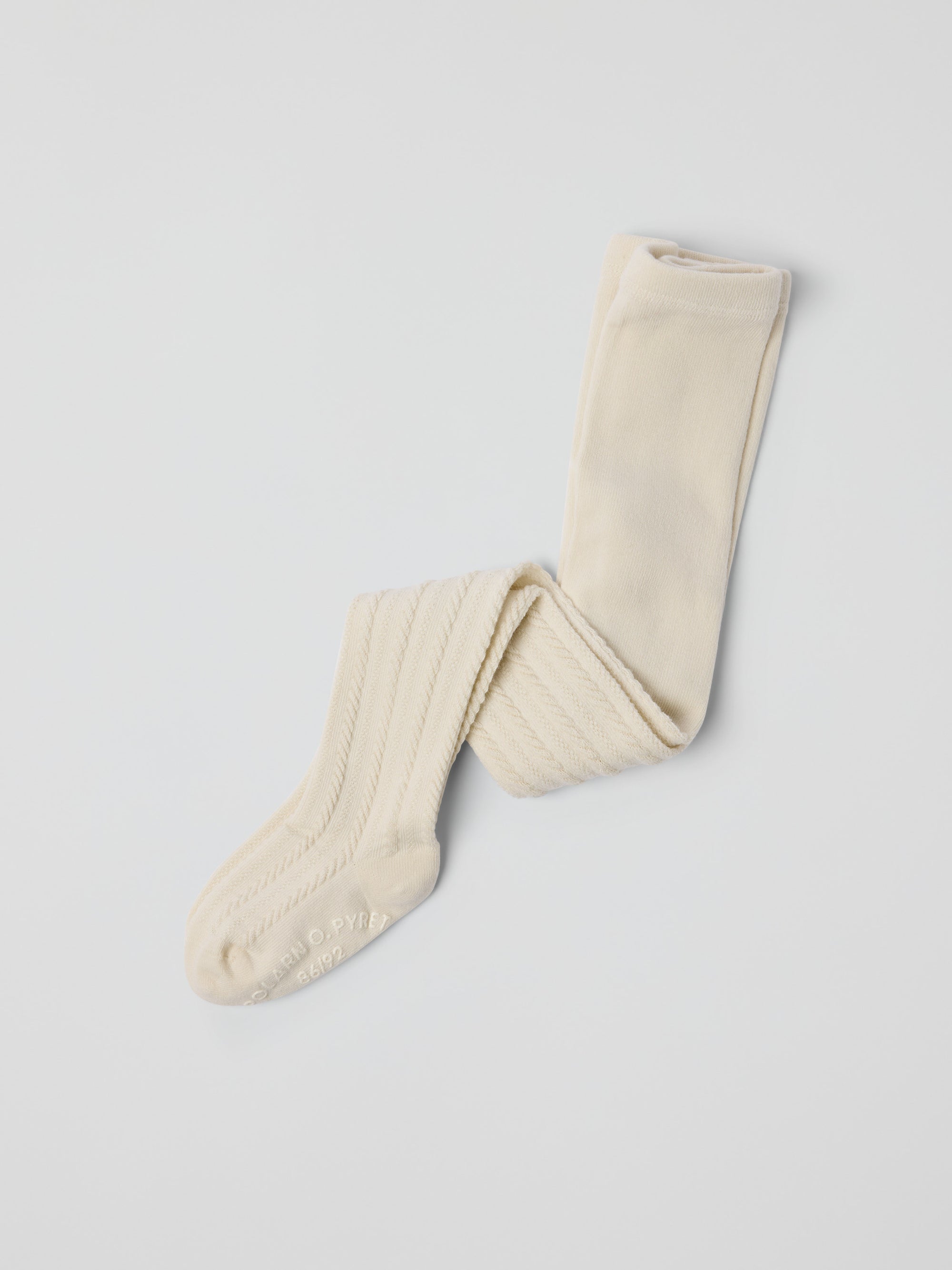 Kabelstickad strumpbyxa - Beige