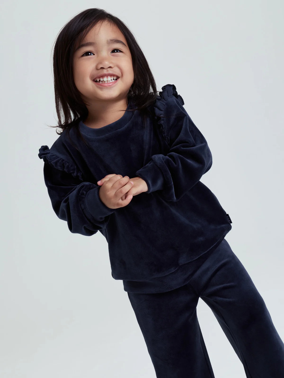 Velúrpeysa með pífum